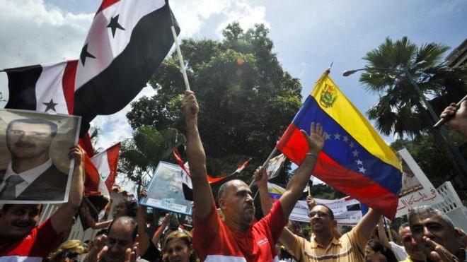 O presidente sírio diz que o que acontece na Venezuela é "semelhante" ao que acontece na Síria/ Direito de imagemAFP