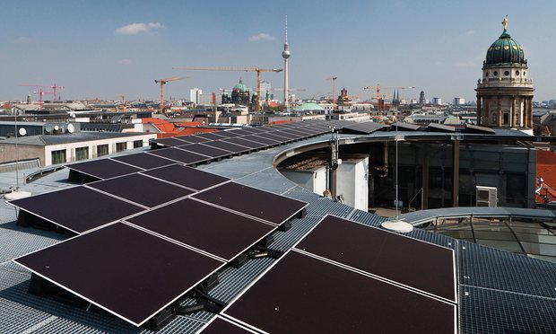 Solar panels on Berlin rooftops. ‘Germany must work hard to maintain our lead on energy transition.’ Photograph: Rolf Schulten/Bloomberg/Getty Images