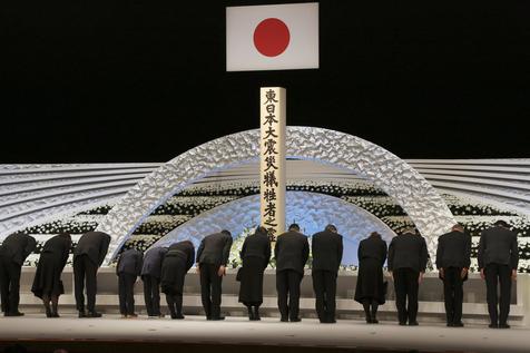 epa05841939 Bereaved family members bow in front of the altar for the victims of the 11 March 2011 earthquake and tsunami, at the national memorial service in Tokyo, Japan, 11 March 2017. Japan marked the sixth anniversary of the earthquake and tsunami devastating northern Japan and Fukushima Daiichi Nuclear Power Plant on 11 March 2017. About 20,000 people were killed and missing by the earthquake and tsunami. In Miyagi Prefecture, more than 10,000 people were killed or missing.  EPA/Koji Sasahara / POOL