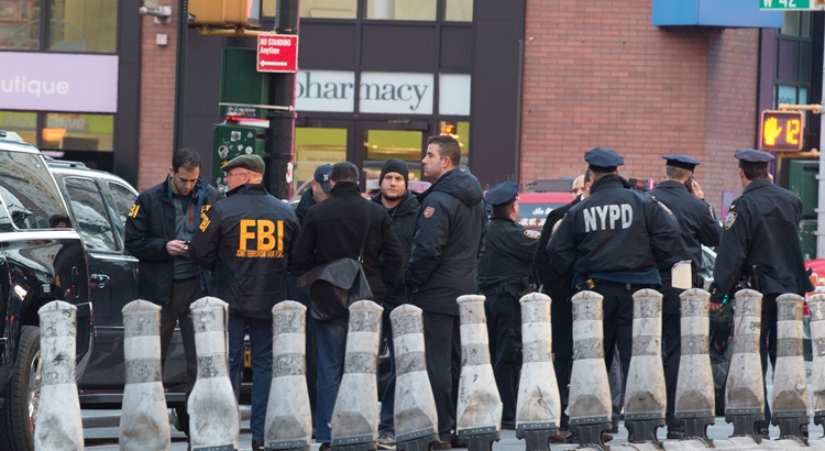 FBI and police respond to a reported explosion at the Port Authority Bus Terminal on December 11, 2017 in New York. 
New York police said Monday that they were investigating an explosion of "unknown origin" in busy downtown Manhattan, and that people were being evacuated. Media reports said at least one person had been detained after the blast near the Port Authority transit terminal, close to Times Square.Early media reports said the blast came from a pipe bomb, and that several people were injured.
 / AFP PHOTO / Bryan R. Smith