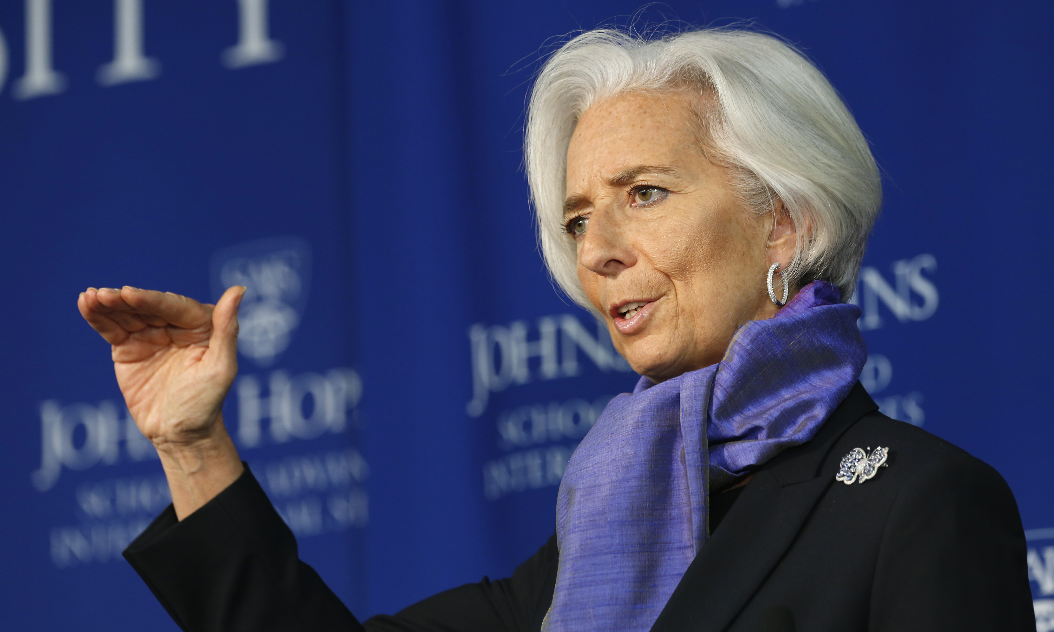 International Monetary Fund Managing Director Christine Lagarde gestures as she speaks about the global economy at the Johns Hopkins School of Advanced International Studies in Washington April 2, 2014. The European Central Bank should ease monetary policy to combat the risk of "low-flation" that could crimp euro zone output and consumer spending, the head of the International Monetary Fund said on Wednesday.

REUTERS/Kevin Lamarque  (UNITED STATES - Tags: POLITICS BUSINESS EDUCATION) - RTR3JO26